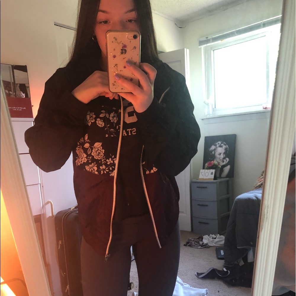 purple and black floral windbreaker